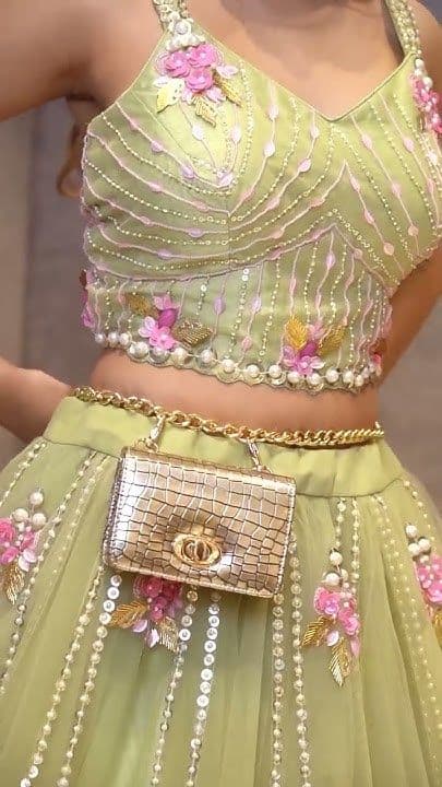 Pistachio Bloom: Haldi Lehenga with Croc Chain Bag