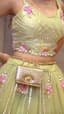 Pistachio Bloom: Haldi Lehenga with Croc Chain Bag