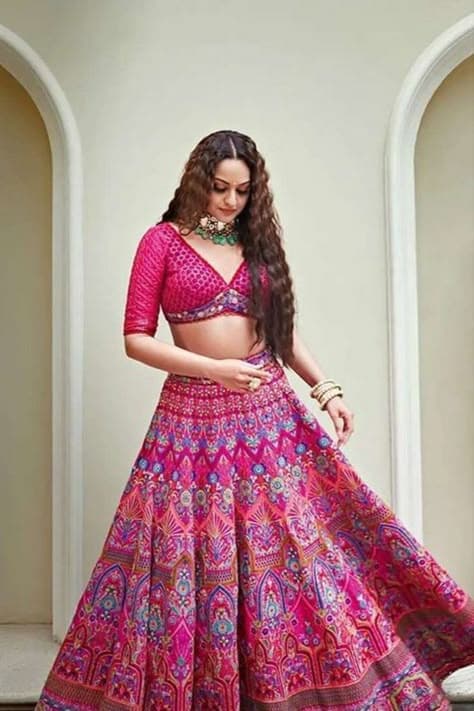 Raspberry Bloom Haldi Lehenga: A Symphony of Joy