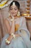 Haldi Bloom: A Bride Bathed in Floral Light