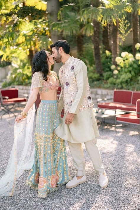 Sunlit Promise: A Haldi Kiss Amidst Verdant Gardens