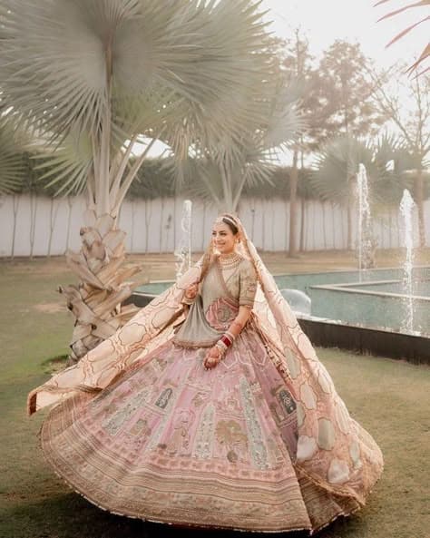 Whispering Blush: A Fairytale Lehenga for Sun-Kissed Brides