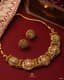 Gilded Memories: Antique Gold Bridal Set with Emerald Accents
