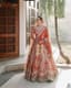 Sun-Kissed Ember: A Bridal Lehenga Woven with Dreams
