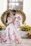 Whispers of Peonies: A Haldi Promise in Bloom