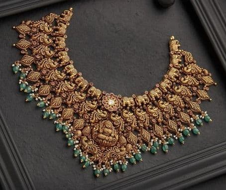 Gaja Lakshmi's Golden Blessing: Emerald-Kissed Bridal Necklace