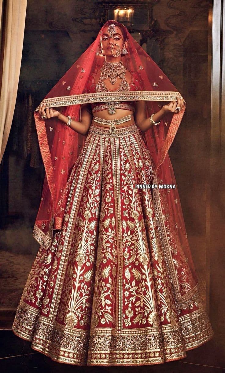 Crimson Bloom: A Bridal Lehenga of Golden Whispers