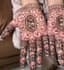 Lotus Embrace: A Haldi Promise Etched in Henna