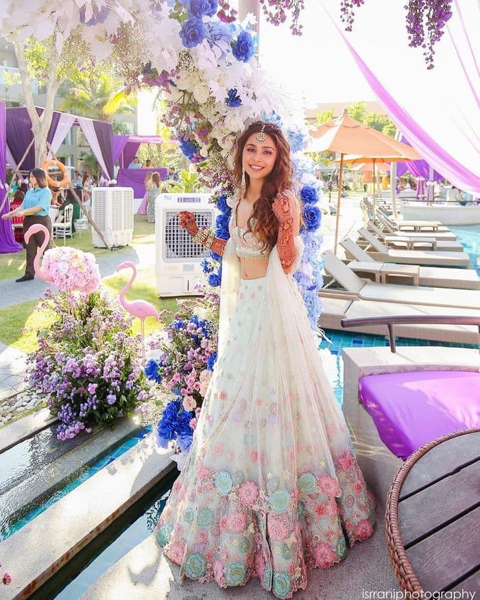 Haldi's Whispering Bloom: A Bride Bathed in Floral Light